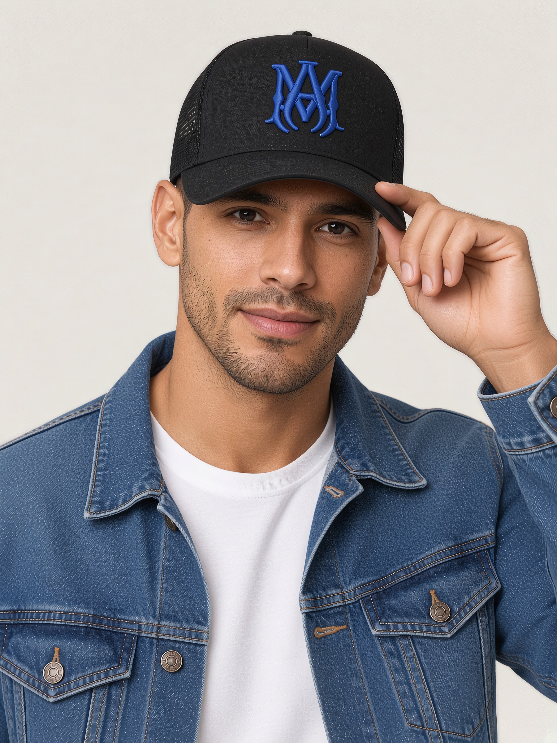 Amiri MA Logo Trucker Hat in Black & Blue