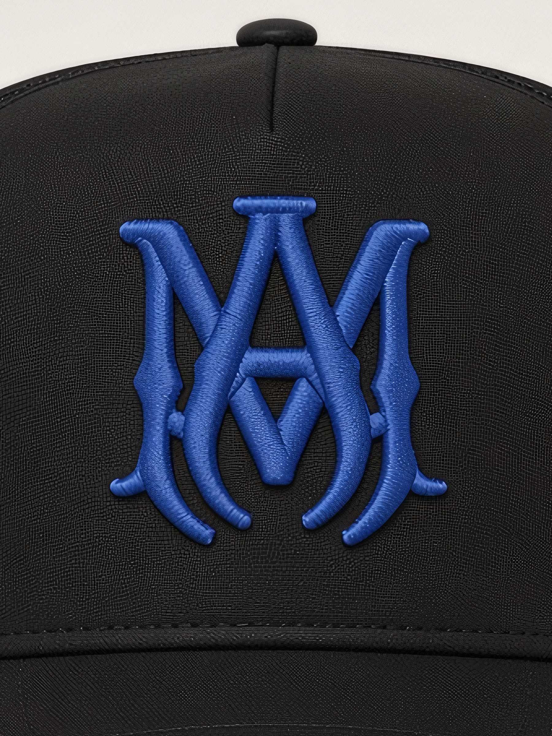 Amiri MA Logo Trucker Hat in Black & Blue