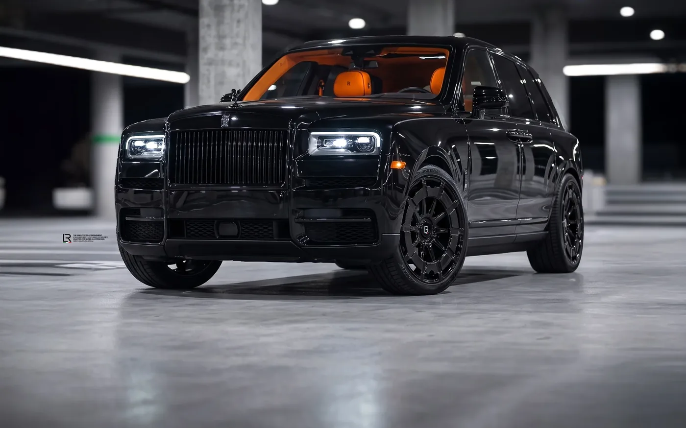 Black Rolls-Royce Cullinan with orange interior