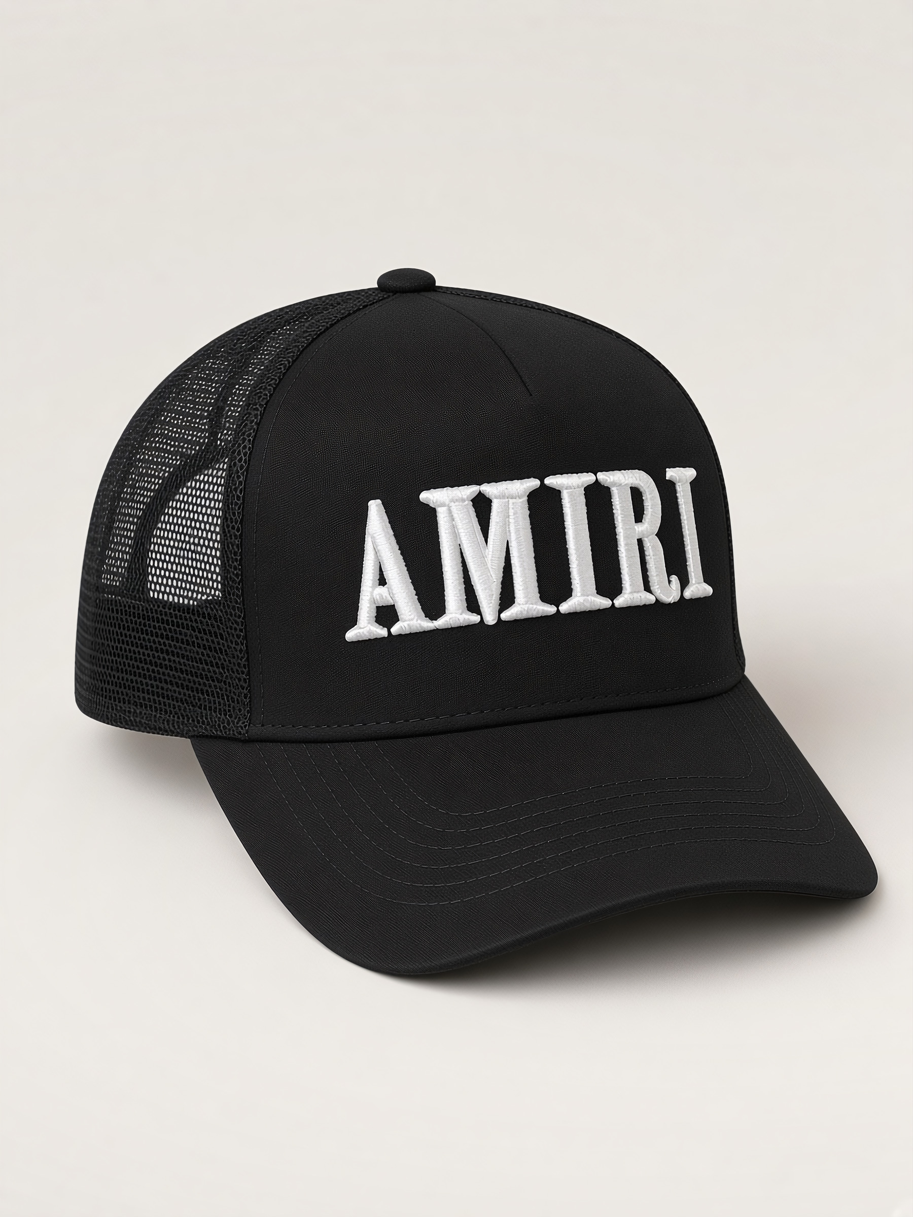 Amiri Core Logo Trucker Hat in Black