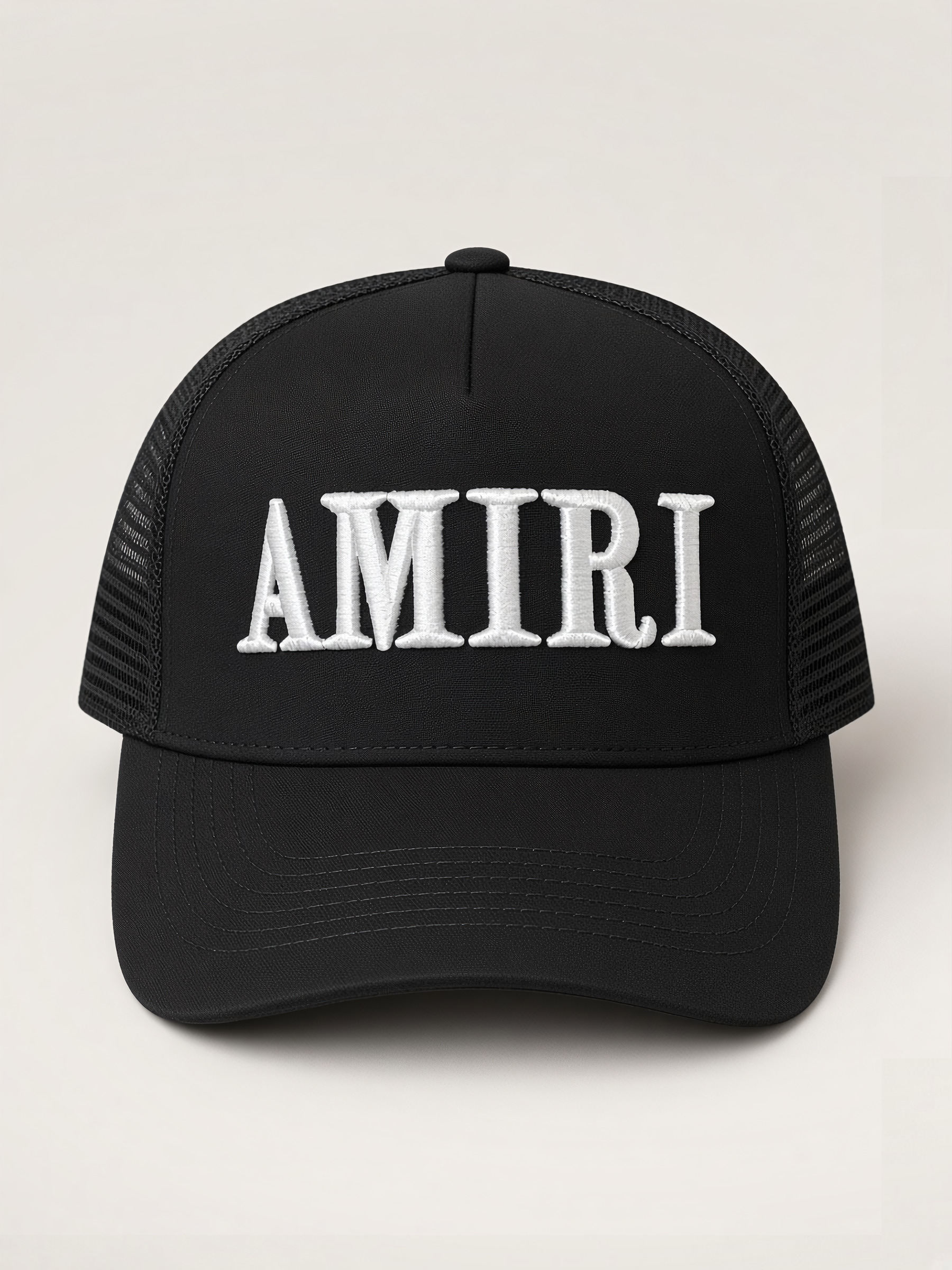 Amiri Core Logo Trucker Hat in Black