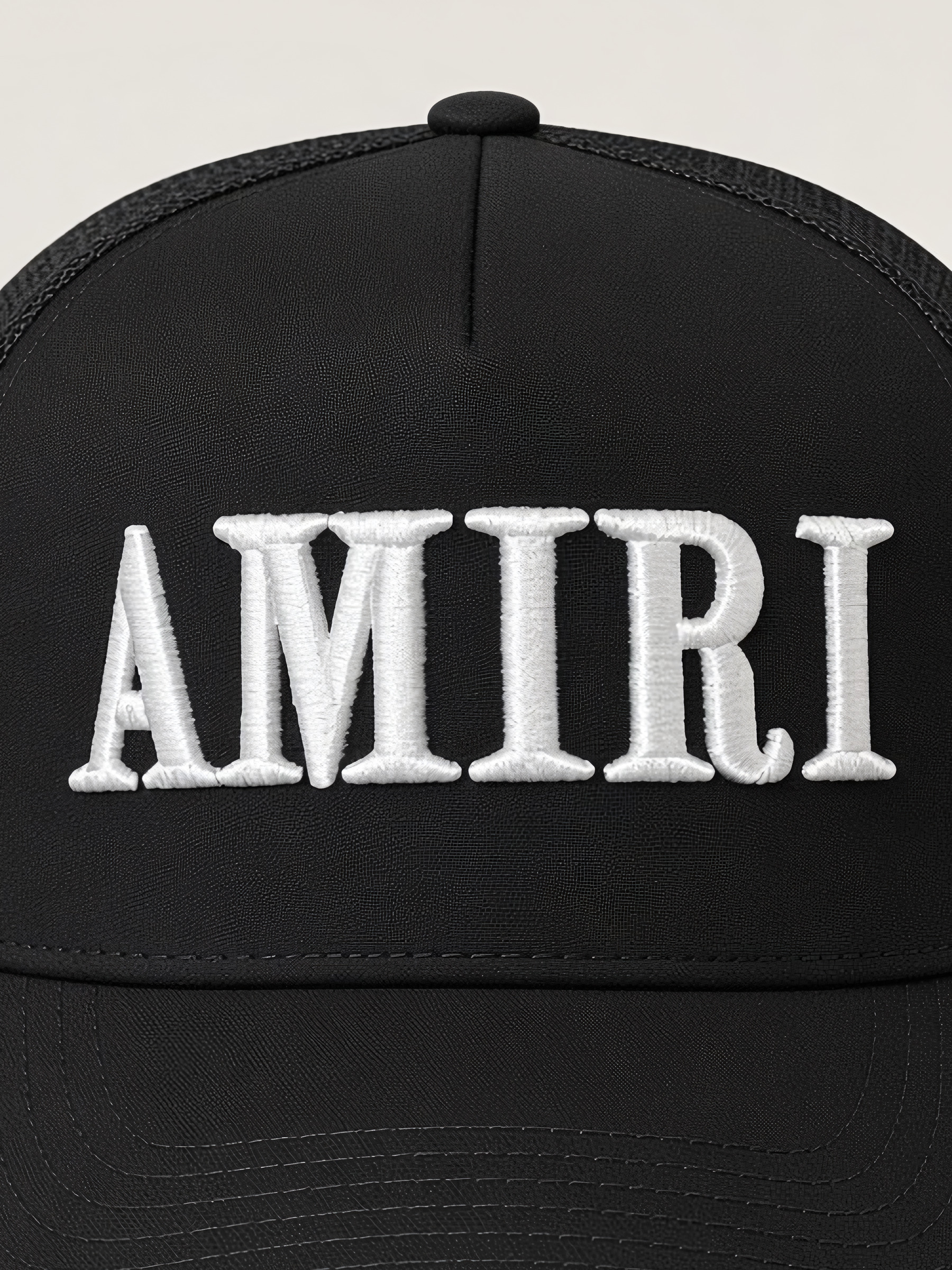 Amiri Core Logo Trucker Hat in Black